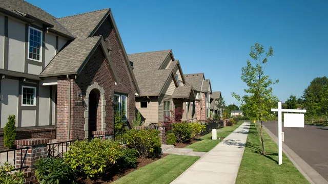 a row of houses for sale